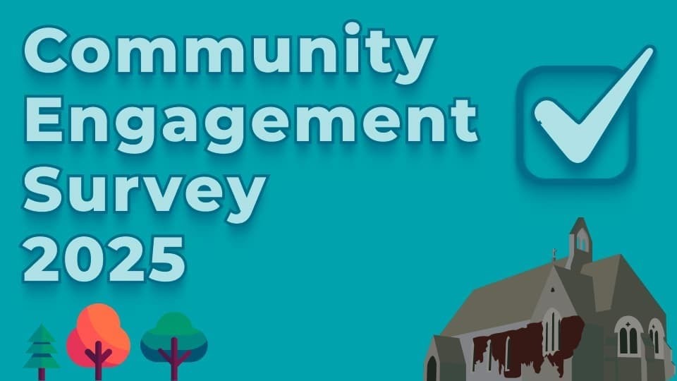 Alt text: "Teal background with bold text: 'Community Engagement Survey 2025' next to a large checkmark. Illustrations of colourful trees and a church in the corner convey a community theme."